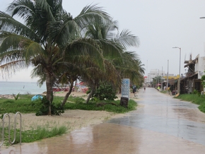 Smooth promenade runs along the sand